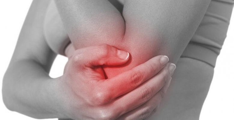 Acute pain in a woman elbow