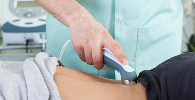 Woman During Laser Physiotherapy