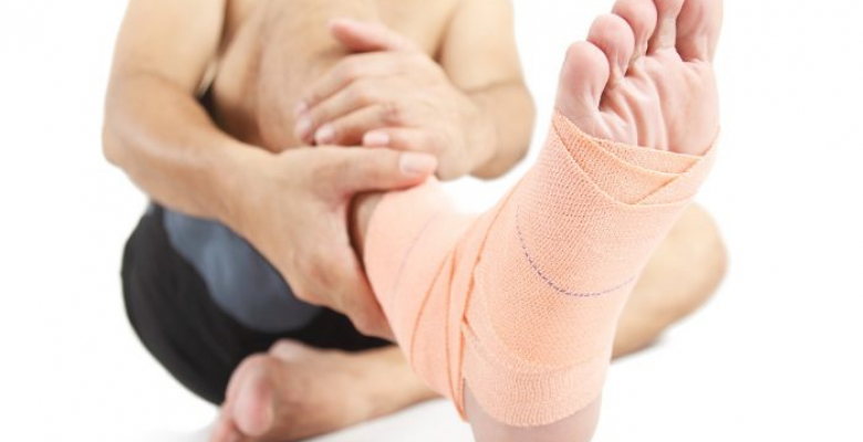 Close up of a foot with bandage.